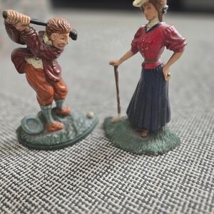 Antique Cast Iron Golfing Couple. 7 Inches Tall.